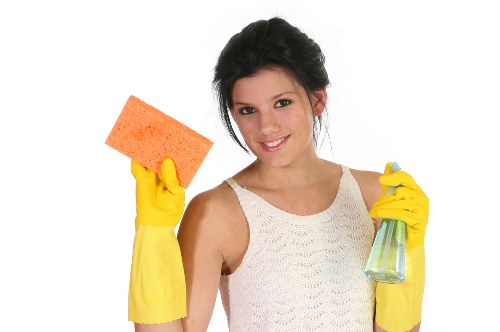 Carpet cleaning staff using safe working practices with protective equipment