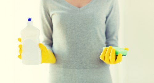 Dust removal from curtains during professional cleaning in North Finchley